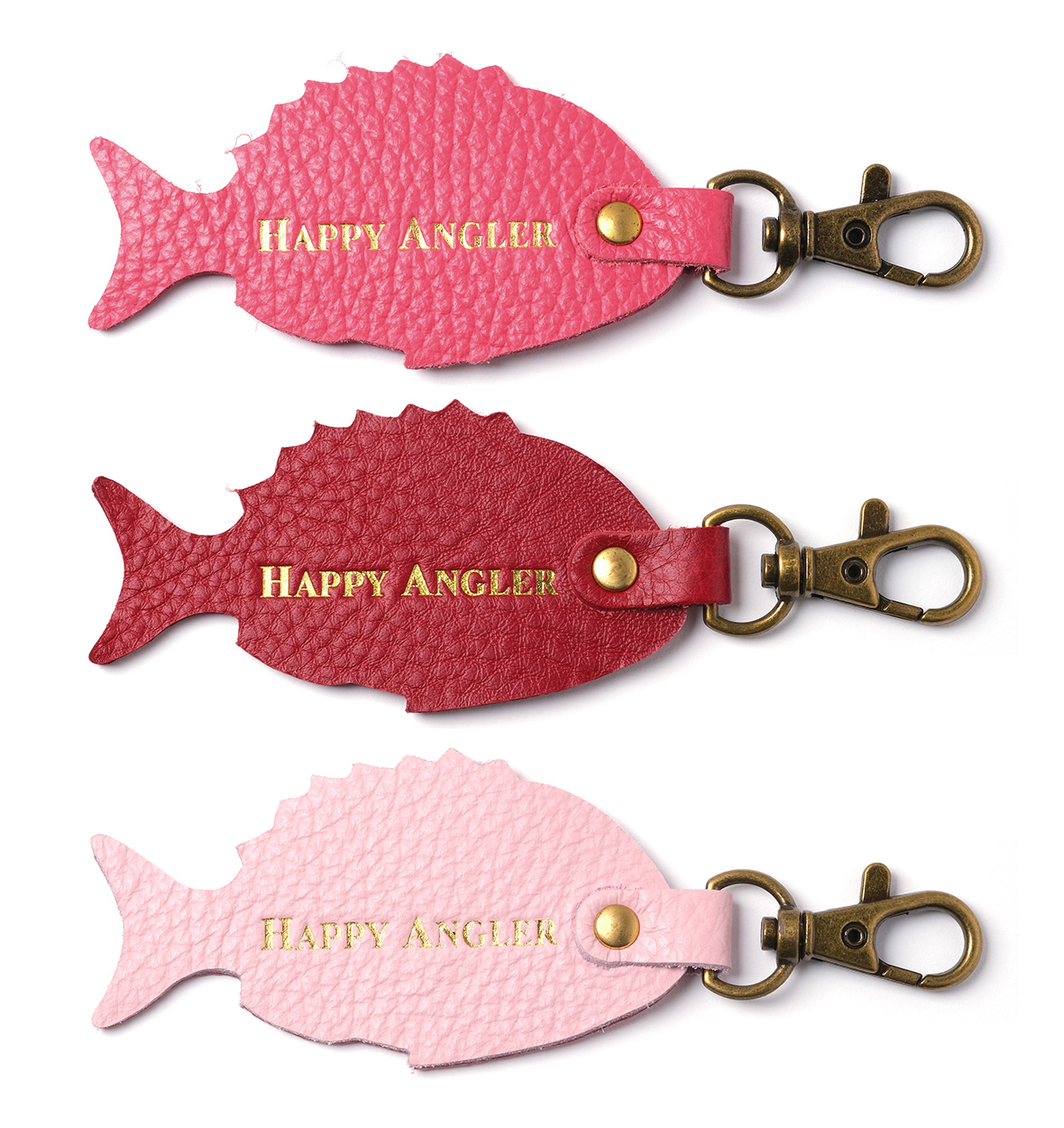 「HAPPY ANGLER リアル魚皮キーホルダー」の「シェイプ：マダイ」の裏面の写真。「HAPPY ANGLER」の文字が刻印されている。